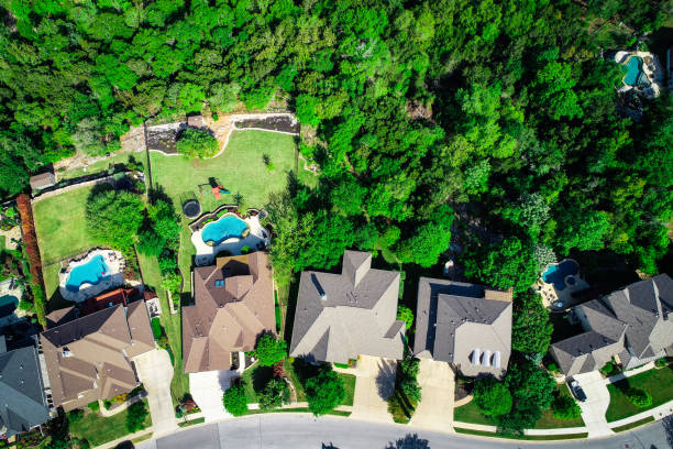 istock Luxury Suburb homes Straight down drone angle above green landscape 1192391553