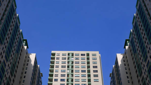 istock residential condominiums with blue sky 1192395148