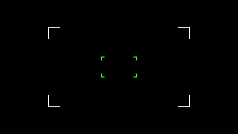 Animation of camera viewfinder with white square frame and flash light on black background