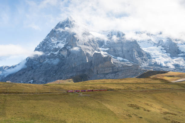 istock Scenic Swiss Alps and red train 1192403717