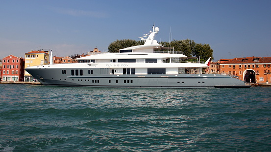 FLYING FOX luxury yacht moored at the embankment near Marinaressa Garden (Giardino della Marinaressa), Venice, Italy