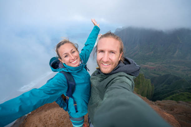 istock Couple hiking in Hawaii taking selfie 1192417815
