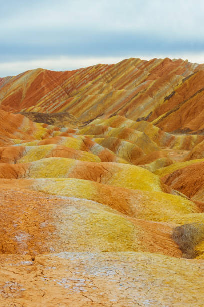 view of Rainbow Mountains in Zhangye Danxia Landform Geological Park view of Rainbow Mountains in Zhangye Danxia Landform Geological Park danxia landform stock pictures, royalty-free photos & images