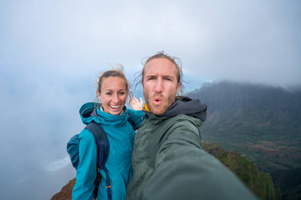 istock Couple hiking in Hawaii taking selfie 1192418842