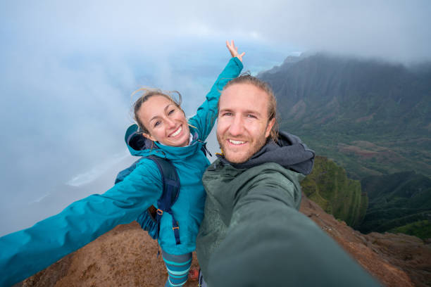 istock Couple hiking in Hawaii taking selfie 1192419283