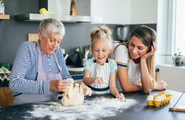 istock Three generation women in the kitchen 1192427502