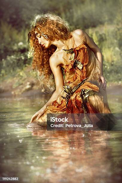 Beautiful Woman Enjoys The Water Stock Photo - Download Image Now - One Woman Only, Redhead, Women