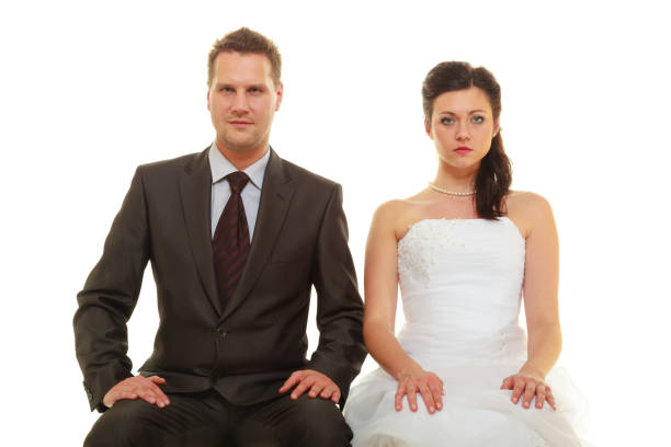 istock Sad groom and bride couple waiting for wedding 1192431432