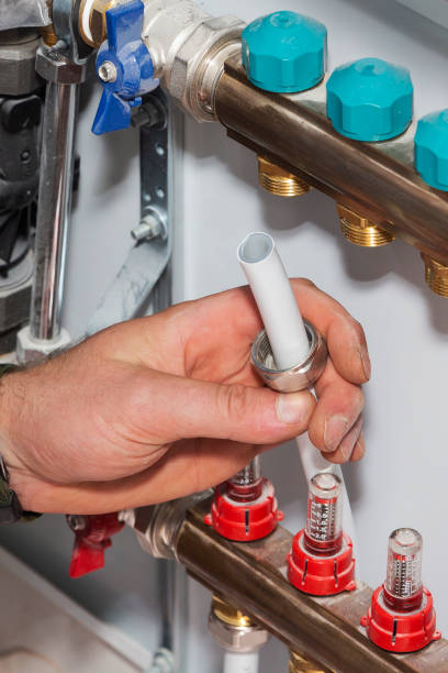 istock pipeline installation of the heating system, connection of Underfloor heating, connection stages 1192432198