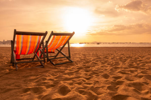 istock A couple canvas beds on the beach with sunset light atmospher 1192440932