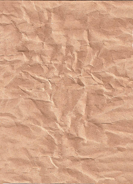 istock Paper crumpled package coffee color background or texture 1192441488