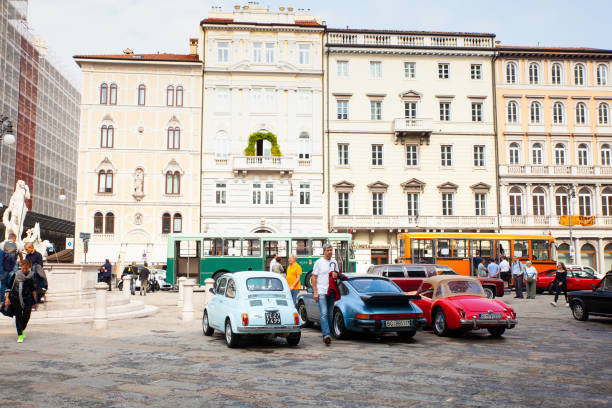 Old Fiat cars like 500 and Porche car exposed at the National Day of the Vintage Vehicle, Trieste TRIESTE, ITALY - OCTOBER, 01: Old Fiat cars like 500 and Porche car exposed at the National Day of the Vintage Vehicle on October 01, 2019 fiat 500 topolino stock pictures, royalty-free photos & images