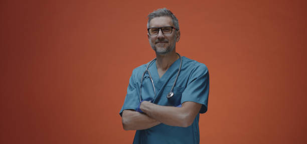 istock Male doctor looking at camera 1192444041