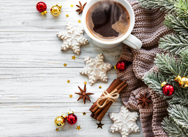Christmas composition with cup of coffee and decorations
