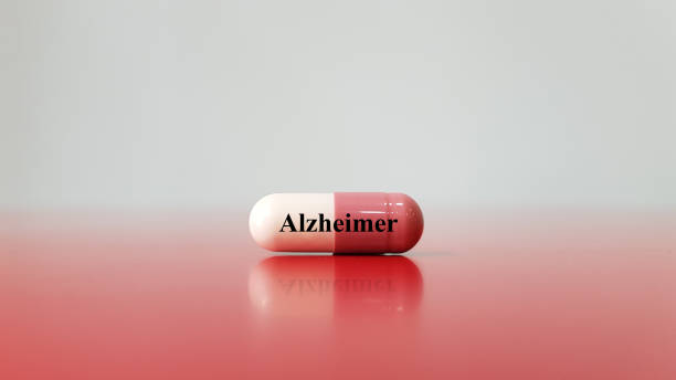 kapsel av medicin för behandling alzheimers sjukdom. alzheimers orsak hjärnceller degeneration som leder till minnesförlust (demenssjukdom). färdigheter. neurologi och medicinteknik. - amyloid bildbanksfoton och bilder