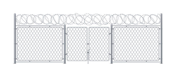 istock Metal fence with gate or chain link wall with wicket and barbed wire. Military or army construction for security with entrance. Protected enclosure with barbwire. Prison or police obstacle, boundary 1192449261
