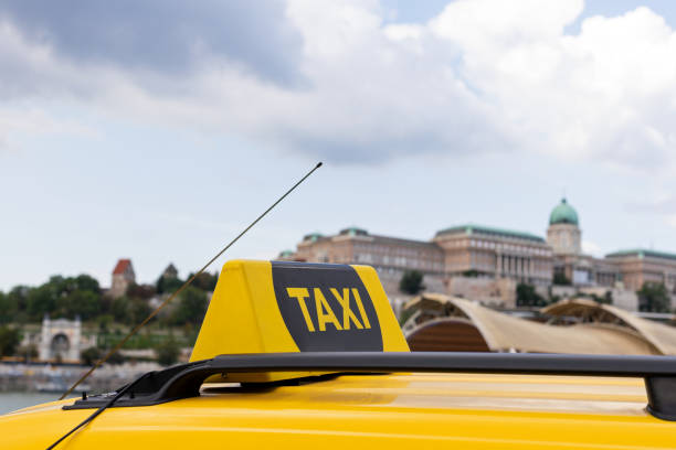 Yellow taxi cabs waiting for a passenger in Budapest