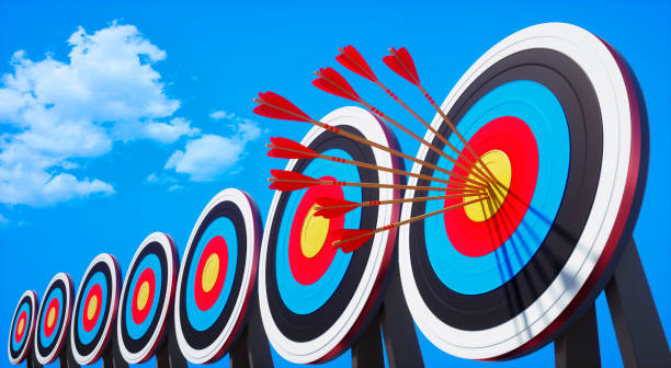 istock Archery target and arrow on blue sky 1192452315