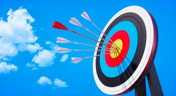 istock Archery target and arrow on blue sky 1192452337