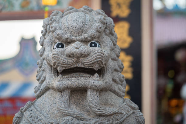 istock Lion statue guard in front of Chinese temple. 1192453272
