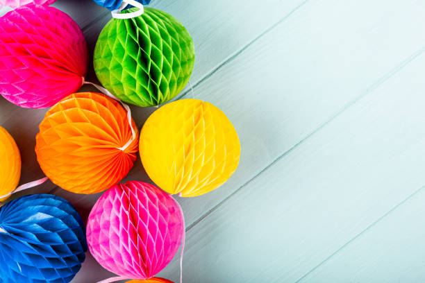 istock Festive background with colorful paper balls. 1192458435