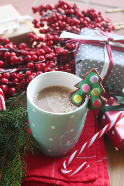 istock Christmas cookie in shape of a Christmas tree on a coffee cup 1192458992