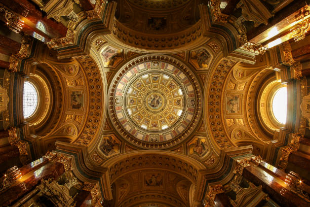 Indoor the St. Stephen`s Basilica in Budapest. The interior is decorated with golden elements.