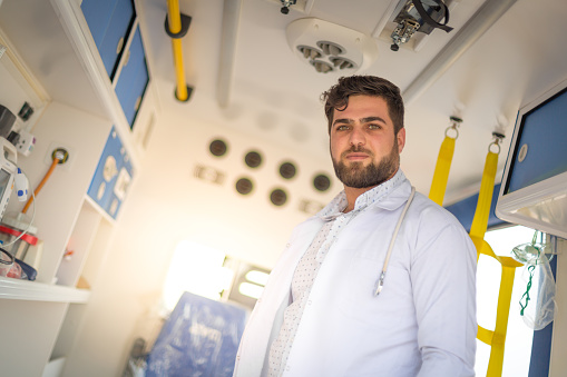 Paramedic in ambulance vehicle