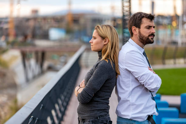 istock Young Woman is Arguing with his Boyfriend and Trying to Solve Problems 1192469367