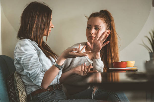 istock Young Female Friends is Having a Coffee Break 1192470273