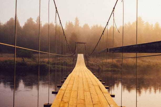 Expansion bridge over river in the sunrise