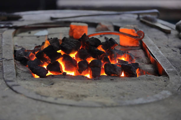 istock Traditional hot-coal furnace in a forge 1192473121