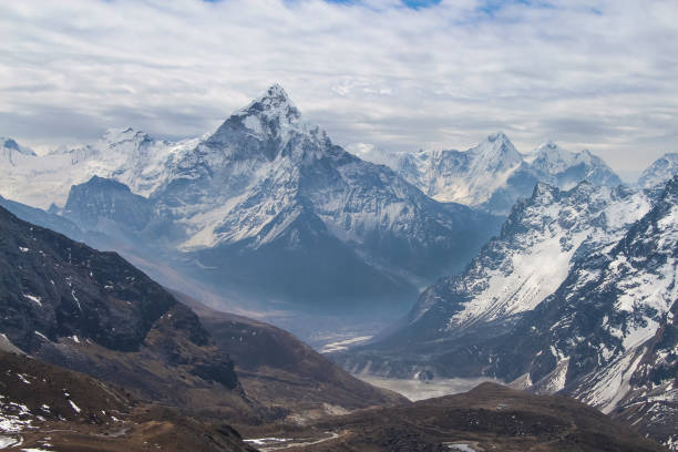 istock Ama Dablam mountain rises above valley in Himalayas 1192473920