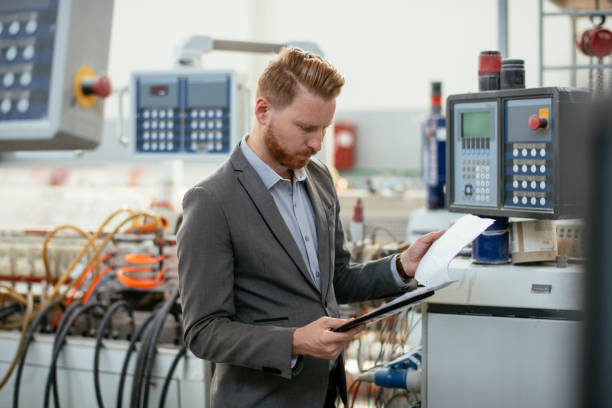 istock Young inspector in factory. 1192473945