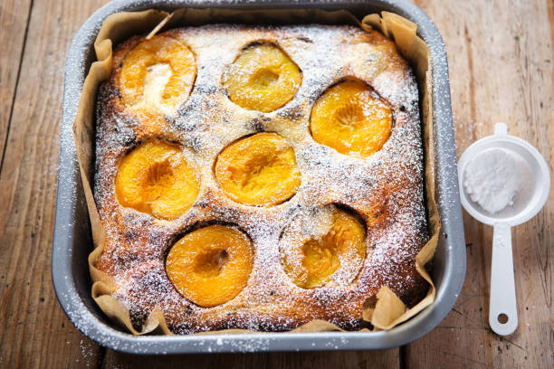 istock Brownie cheesecake with apricots icing sugar 1192474261