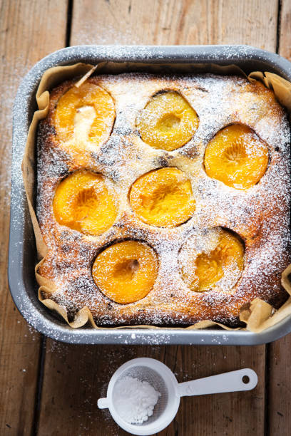 istock Brownie cheesecake with apricots icing sugar 1192474300