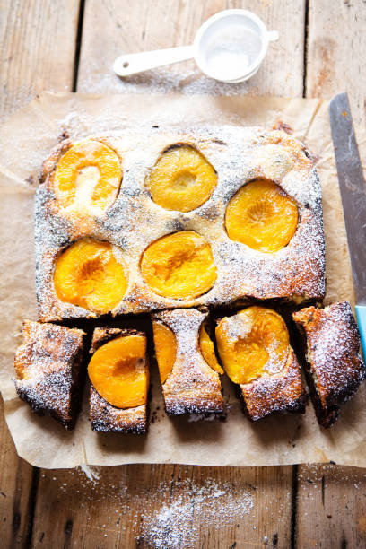 istock Brownie cheesecake with apricots icing sugar 1192474317