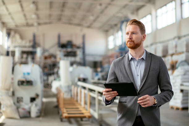 istock Young inspector in factory. 1192475447