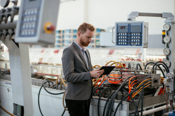 istock Young inspector in factory. 1192475474