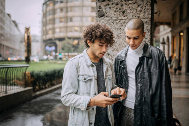 istock Friends using smart phone to check shopping list 1192478567