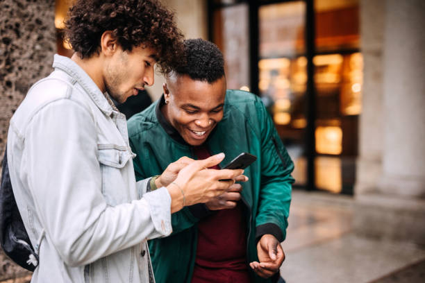 istock Friends using smart phone at the break after shopping 1192479446
