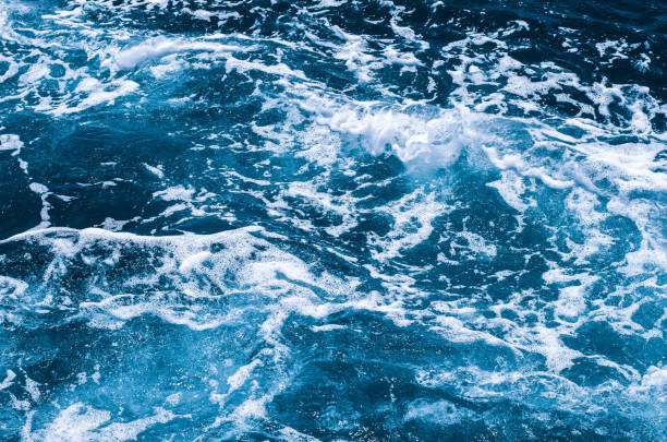 istock Blue foamy surface of the sea 1192479449