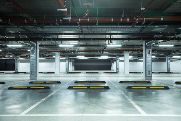 istock Horizontal image of empty underground parking lot 1192482587