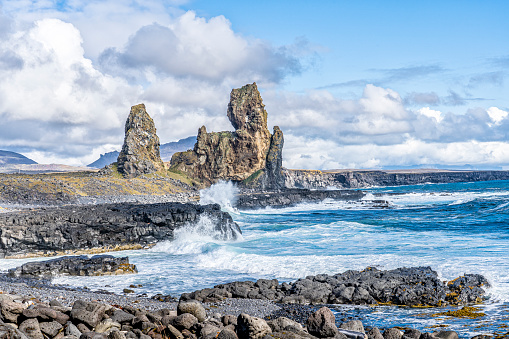 Londrangar basalt rock monolith at the southcoast of Snaefellsness peninsula in western Iceland, landscape photography