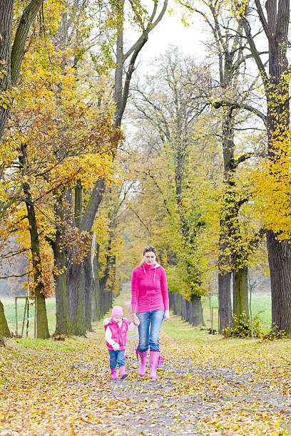 istock people in autumnal alley 119248456