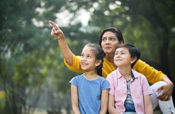istock Family admiring view at public park 1192486997