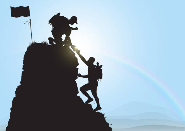 istock Silhouette of two people climbing mountain helping each other on blue sky background, helping hand and assistance concept vector illustration 1192489368