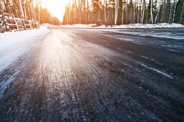 istock Road covered in winter snow 1192491517
