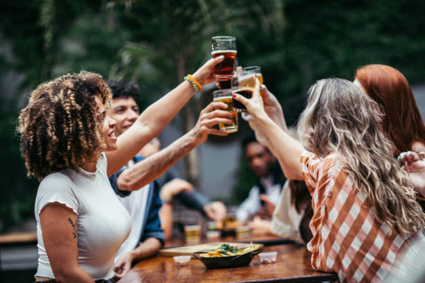istock Friends drinking beer in pub 1192494381