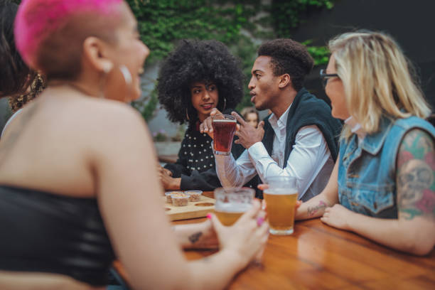 istock Friends drinking beer in pub 1192494467
